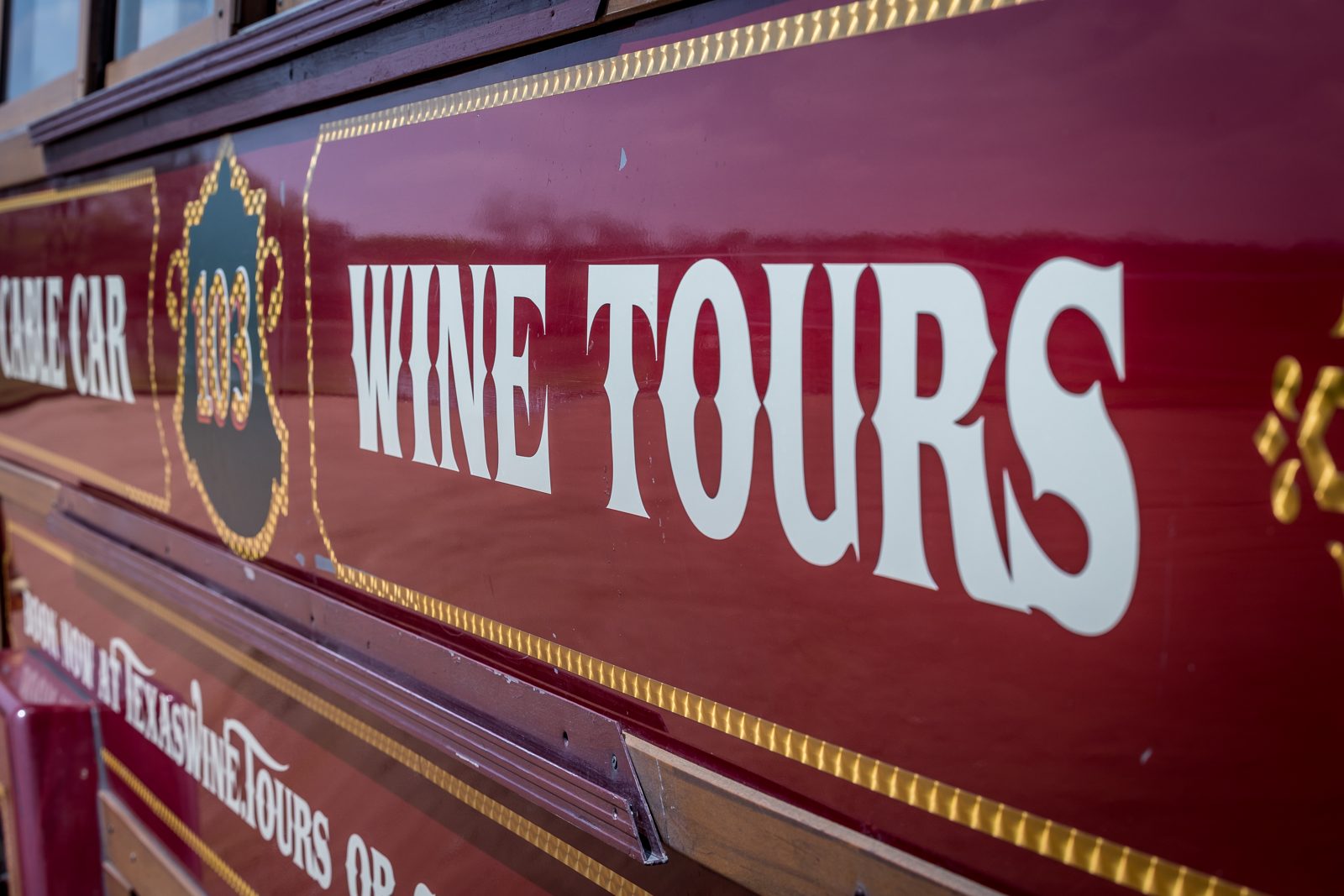 Hand-painted Wine Tours livery on our restored cable car