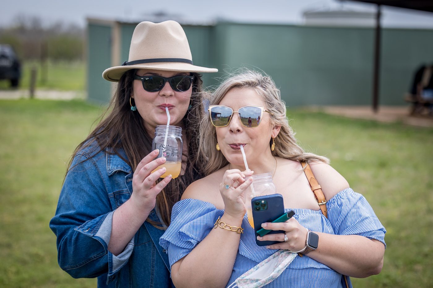 Guests enjoying frozen wine on the lawn between stops
