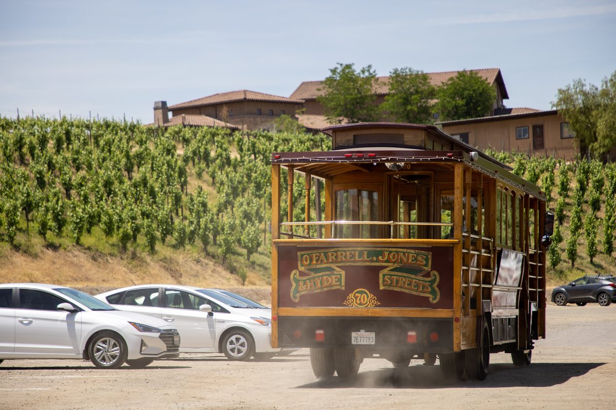 The cable car rolling out past the vineyards